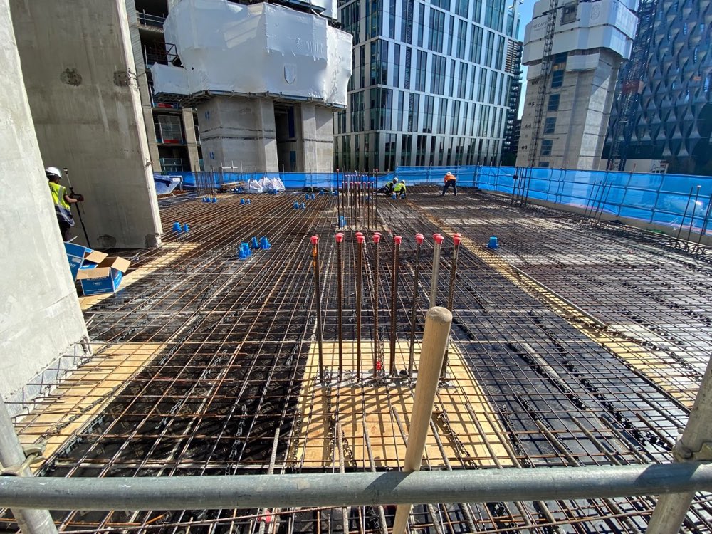 Reinforcement bar cages laid out ahead of a concrete pour